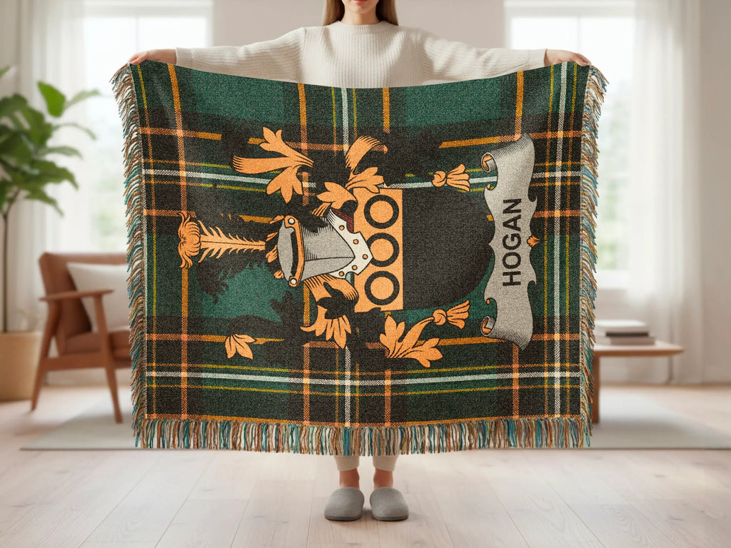 Green plaid blanket with Hogan family crest and name.