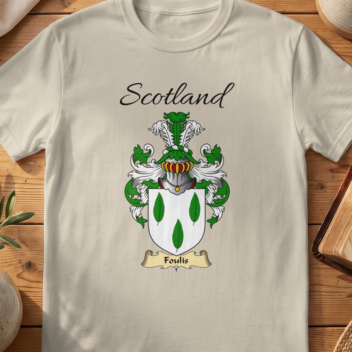 Sand Foulis Scottish family shield T-shirt featuring three green leaf shapes on white