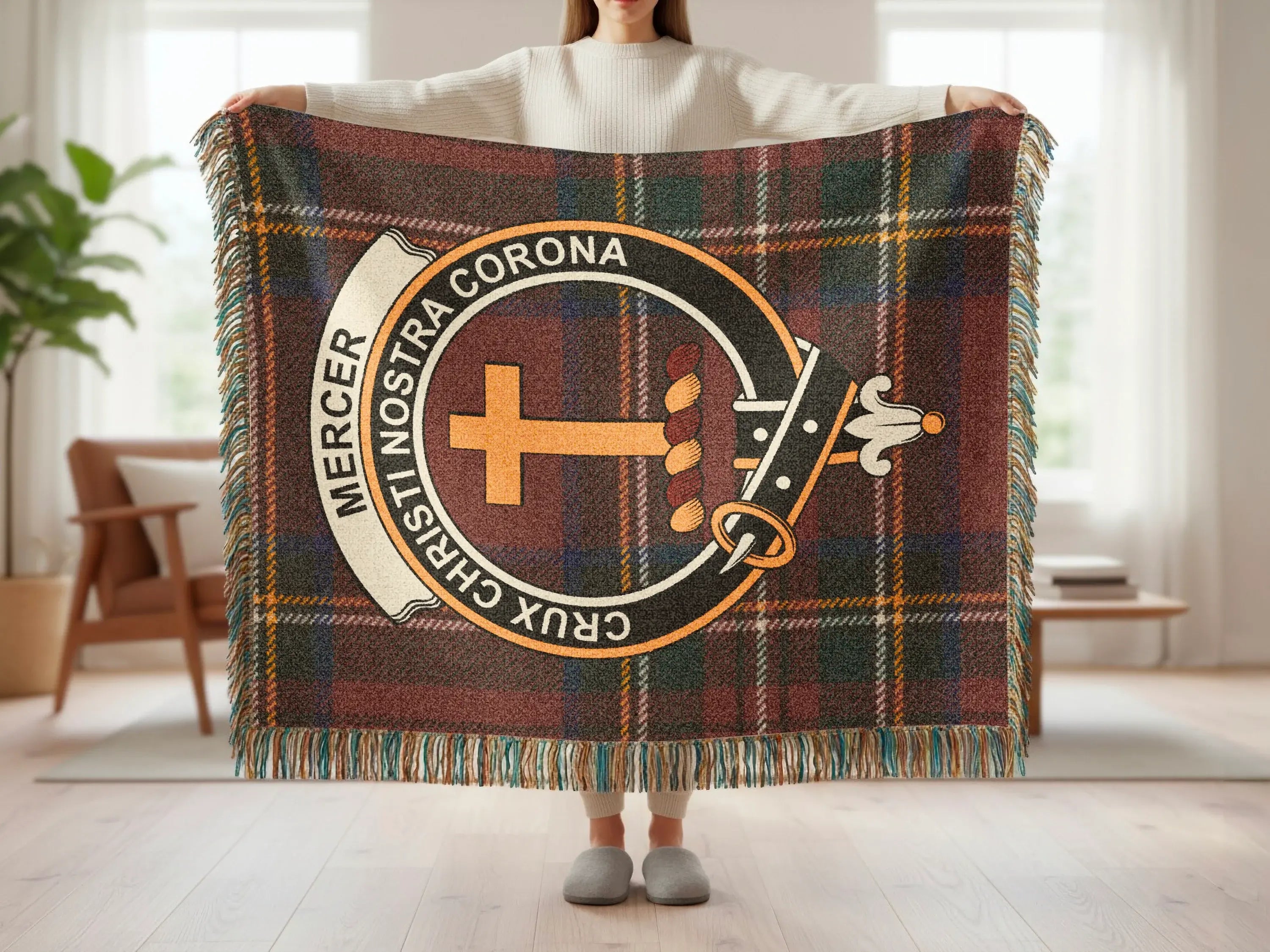 Mercer tartan woven blanket showing clan crest detail — cotton construction with fringe border