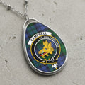 Campbell clan Scottish tartan necklace with clan crest and Ne Obliviscaris motto on tartan background