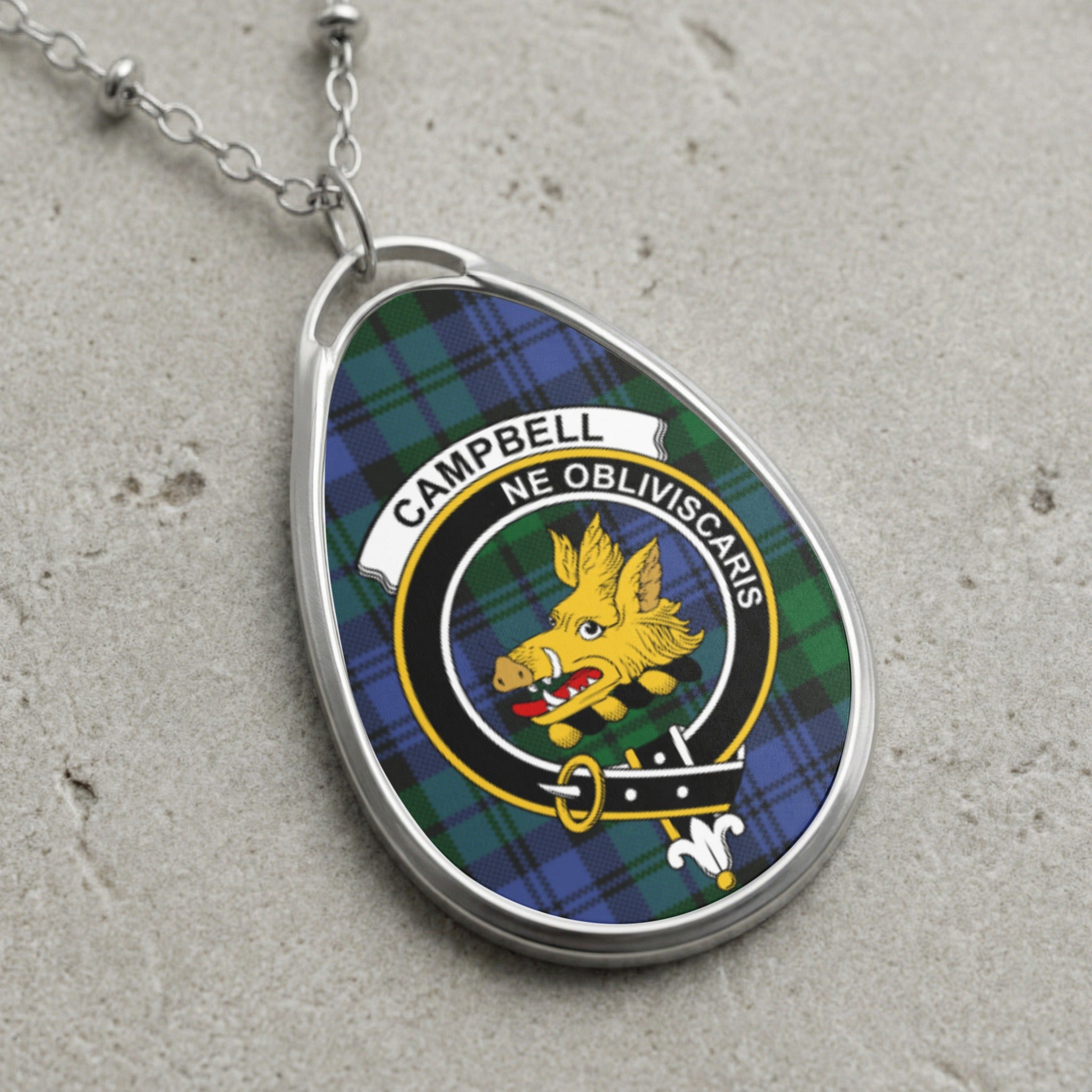 Campbell clan Scottish tartan necklace with clan crest and Ne Obliviscaris motto on tartan background