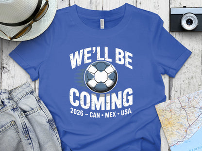 We'll Be Coming 2026 CAN MEX USA Soccer themed tee