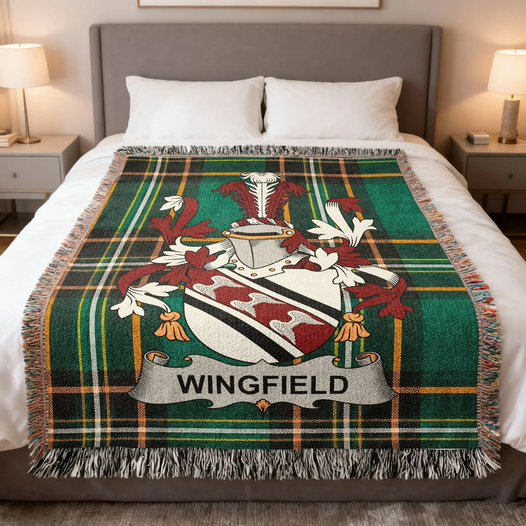 Tartan throw blanket with the Wingfield coat of arms centered.