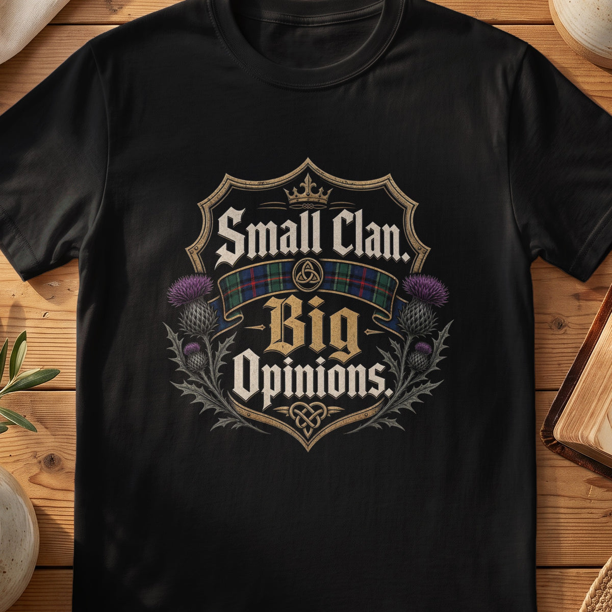 Black Gildan 64000 unisex T-shirt flatlay with Small Clan Big Opinions Scottish graphic design