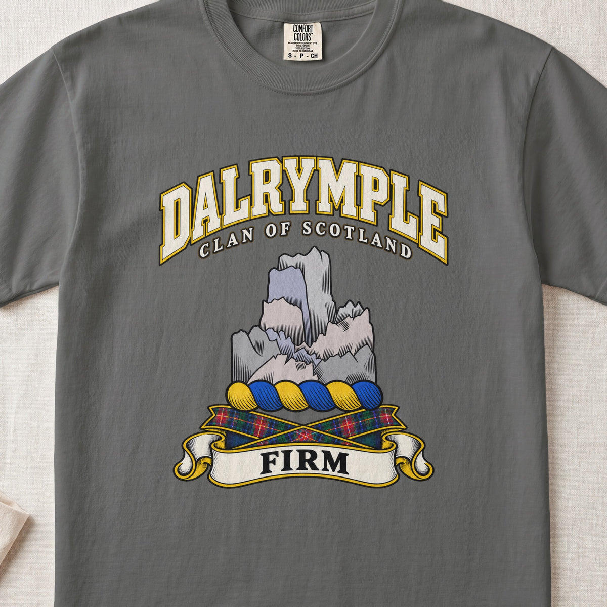 Dalrymple Scottish clan T-shirt in Pepper, front view with a gray rock formation and motto design.
