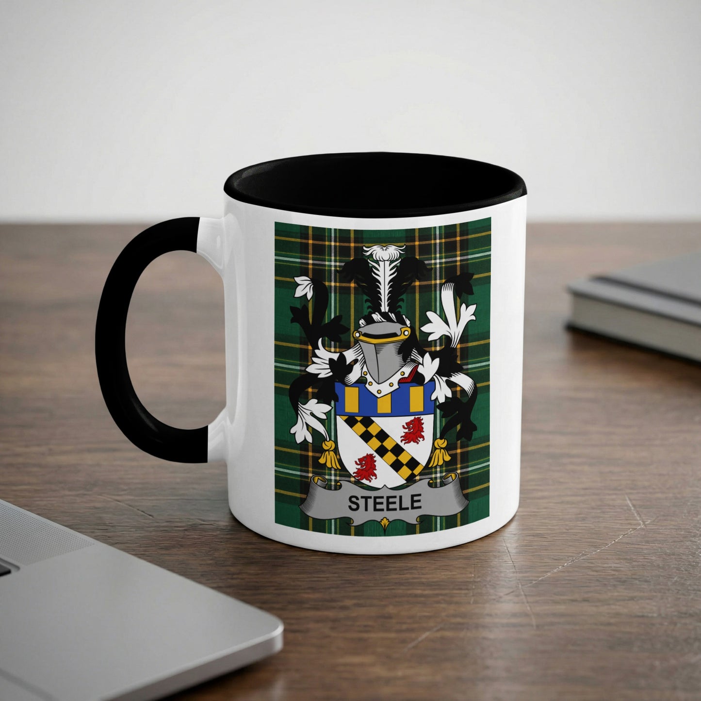 White mug with black handle featuring the Steele family coat of arms.