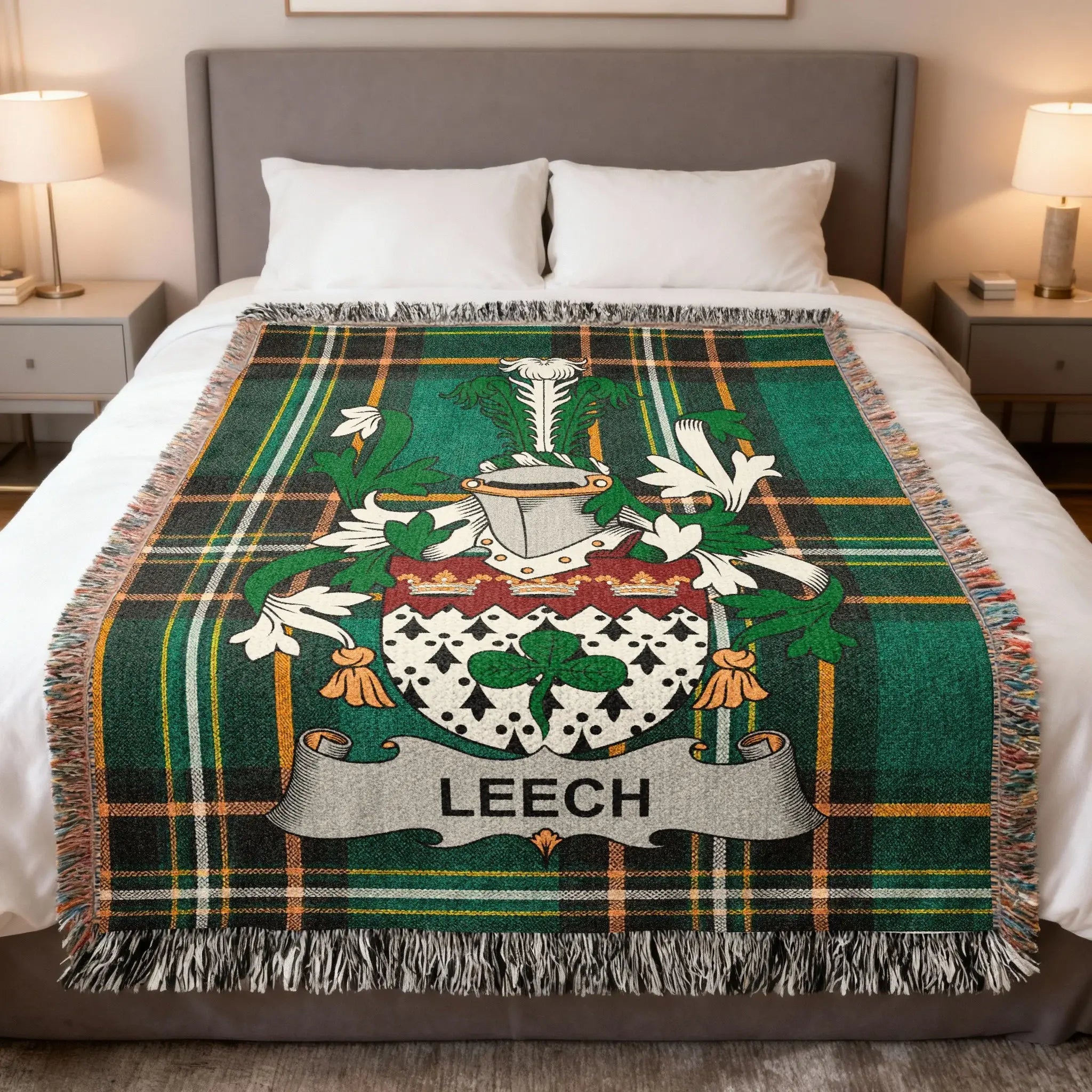 Tartan blanket with Leech family crest in white and green.