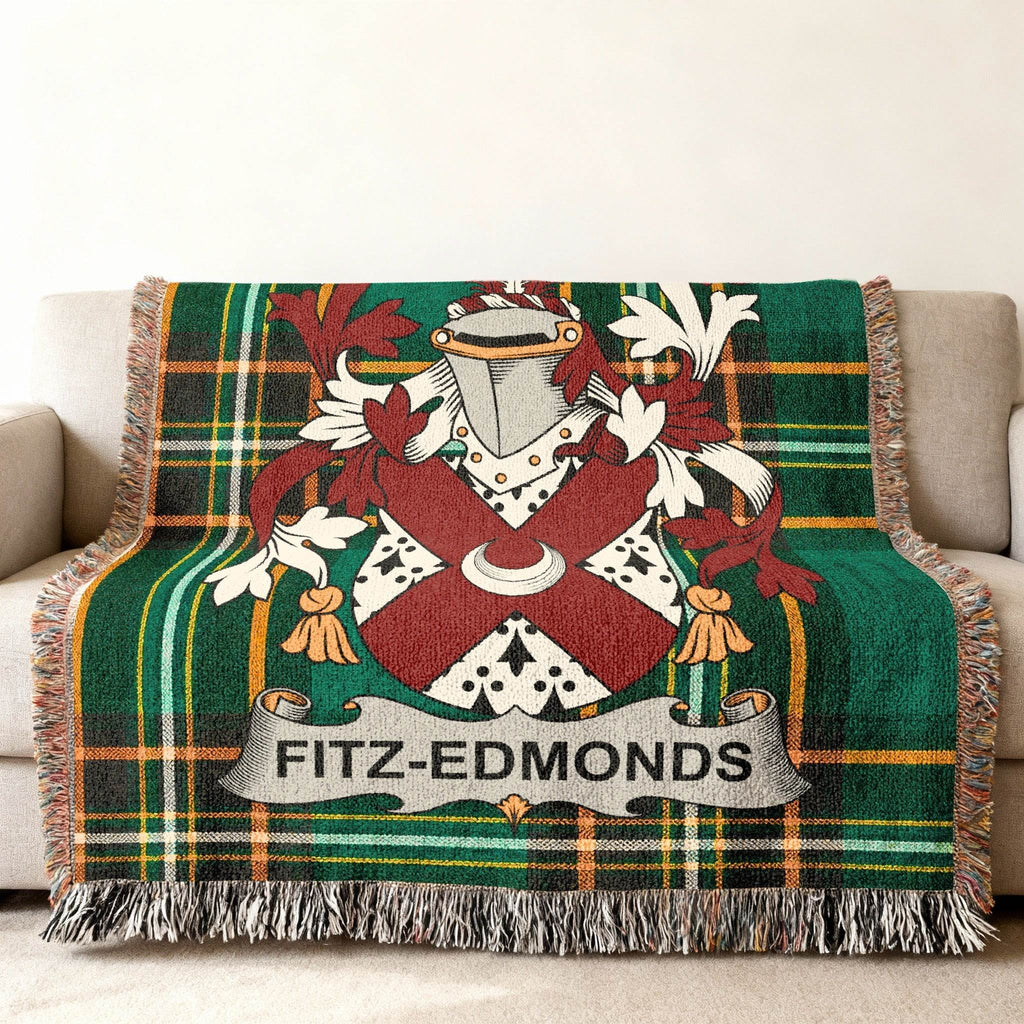 Green tartan blanket with Fitz-Edmonds family crest displayed prominently.