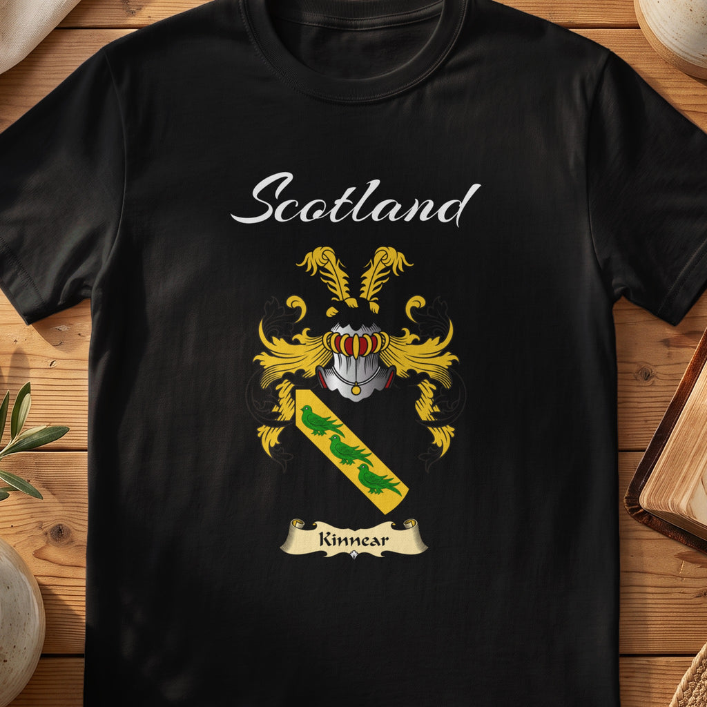 Black Kinnear Scottish T-shirt featuring a gold diagonal band with green leaves on black