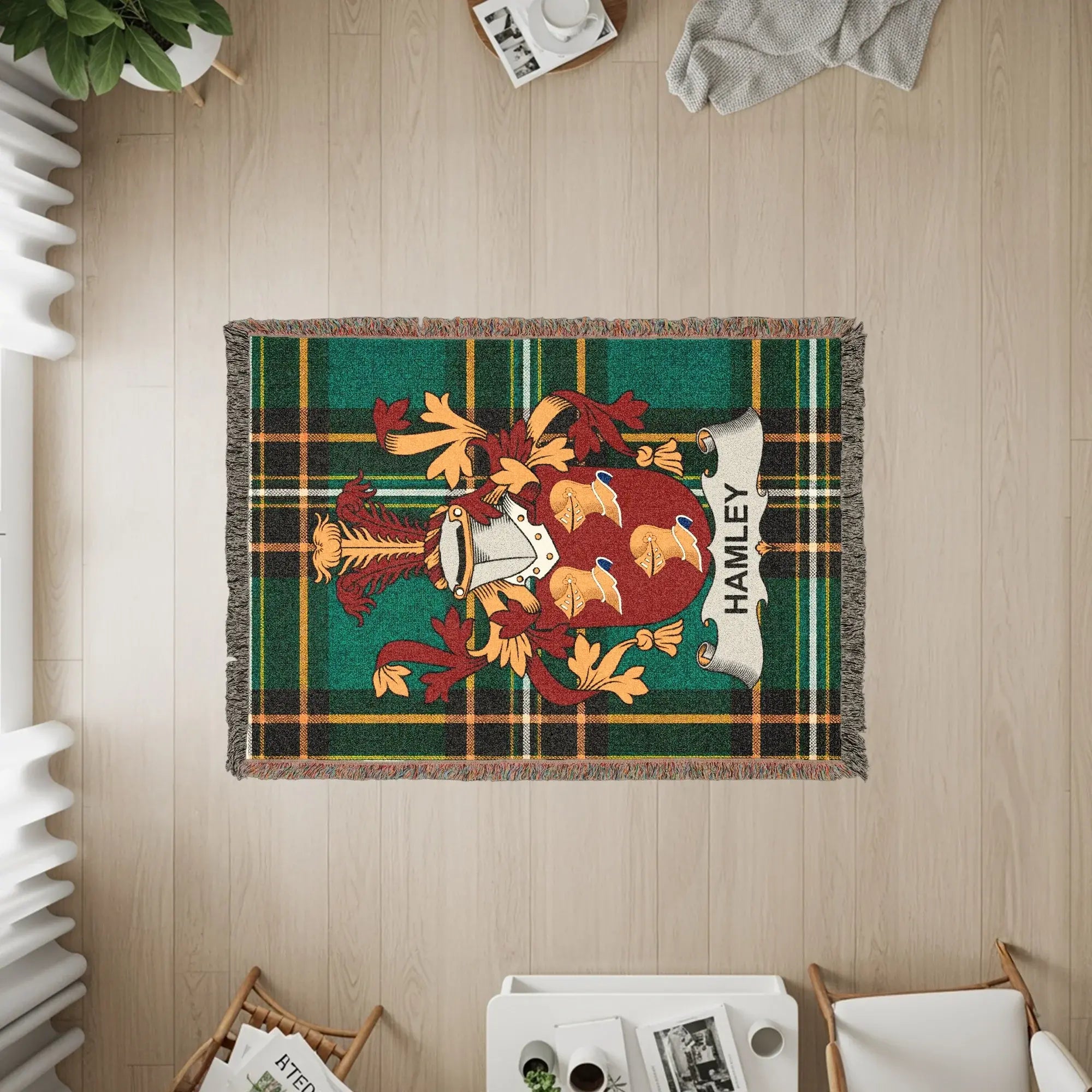 Tapestry with plaid pattern, a coat of arms, and "HAMLEY" text.