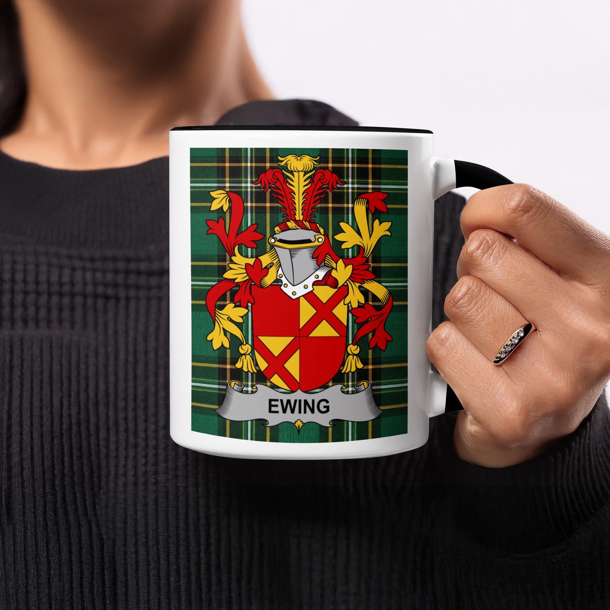 Black and white mug featuring the Ewing family crest on a tartan background.