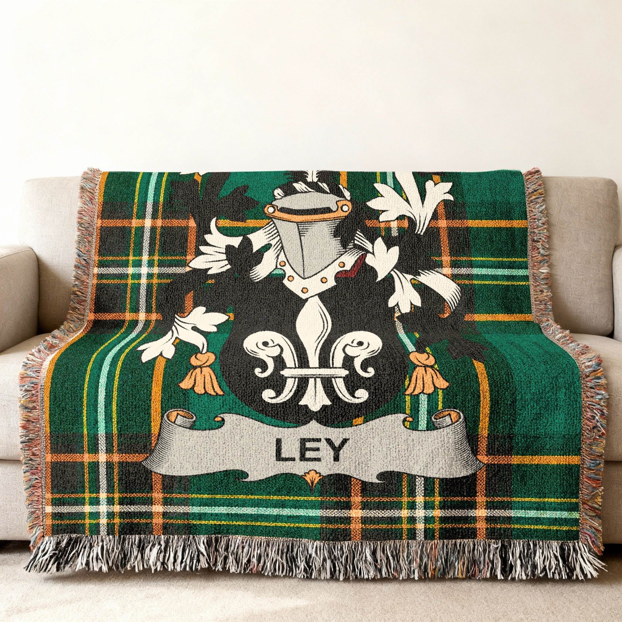 Green plaid throw blanket with the Ley family crest.