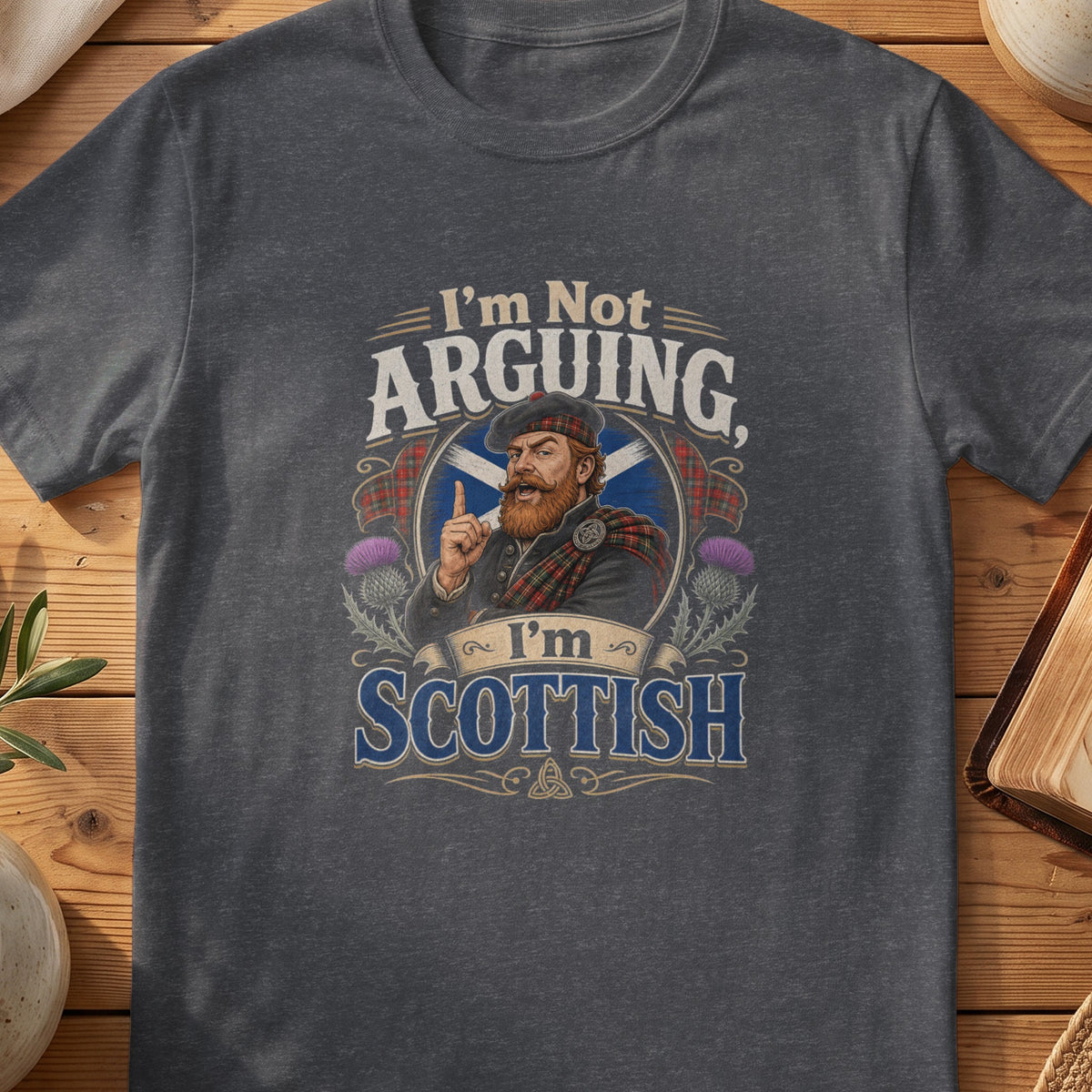 Dark grey Gildan 64000 unisex T-shirt flatlay with I'm Not Arguing I'm Scottish Scottish graphic design