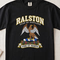 Ralston Scottish clan T-shirt in Black, front view with a brown eagle with spread wings and motto design.