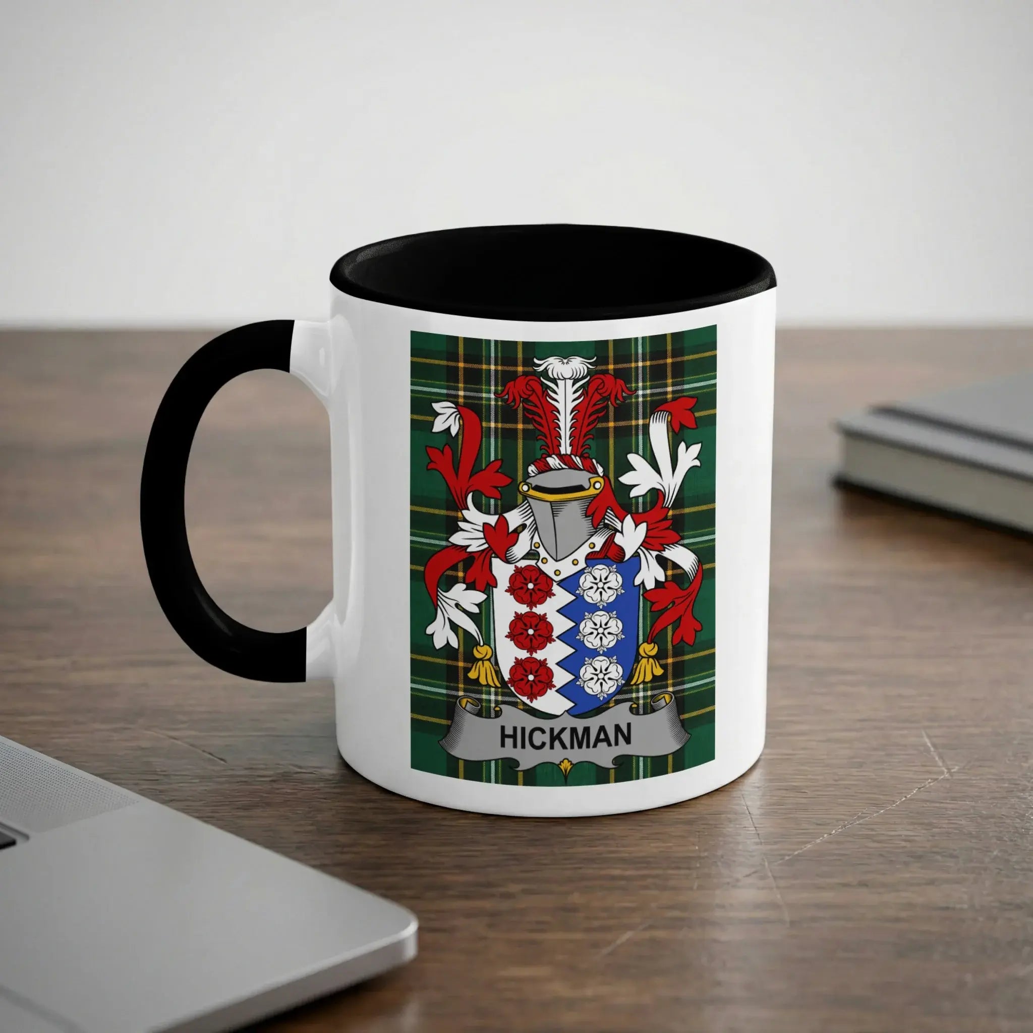 White mug with black rim featuring a coat of arms with "Hickman" banner.
