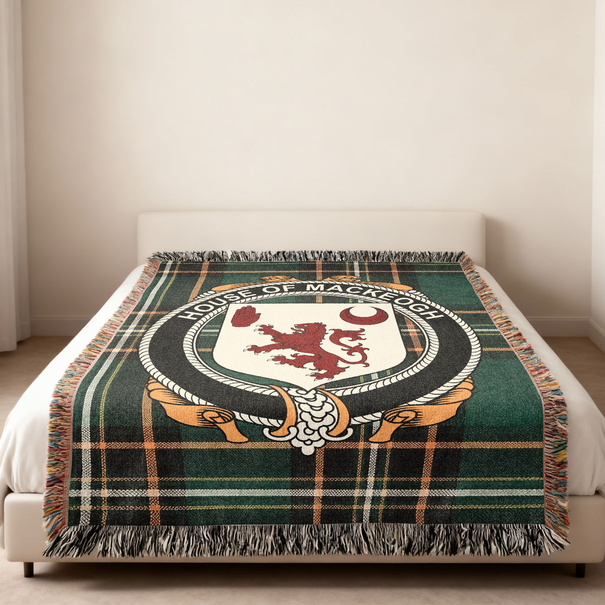 MacKeogh family crest emblem woven blanket displayed on a bed