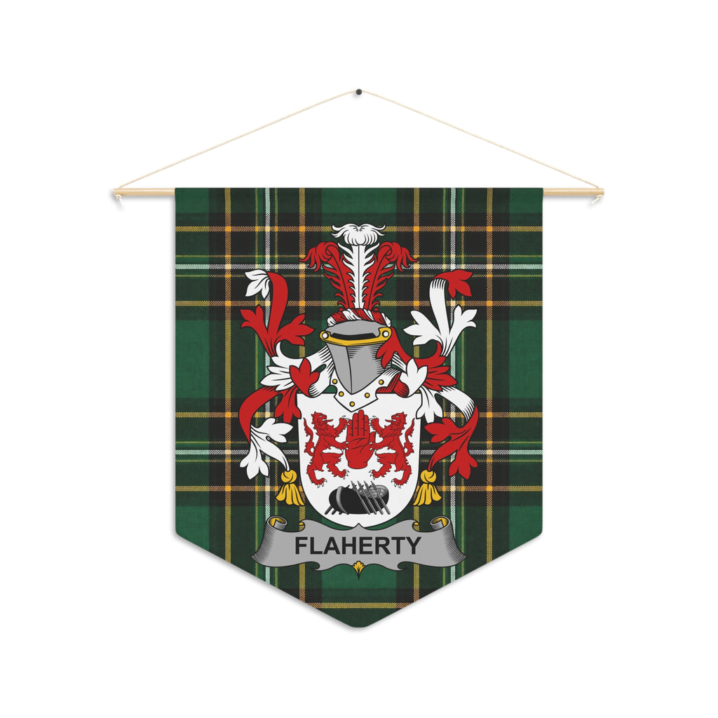 Flaherty tartan pennant with crest, hanging from a wooden dowel and string.