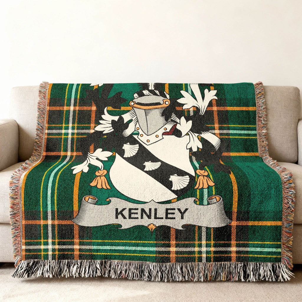 Kenley tartan throw blanket with a coat of arms.
