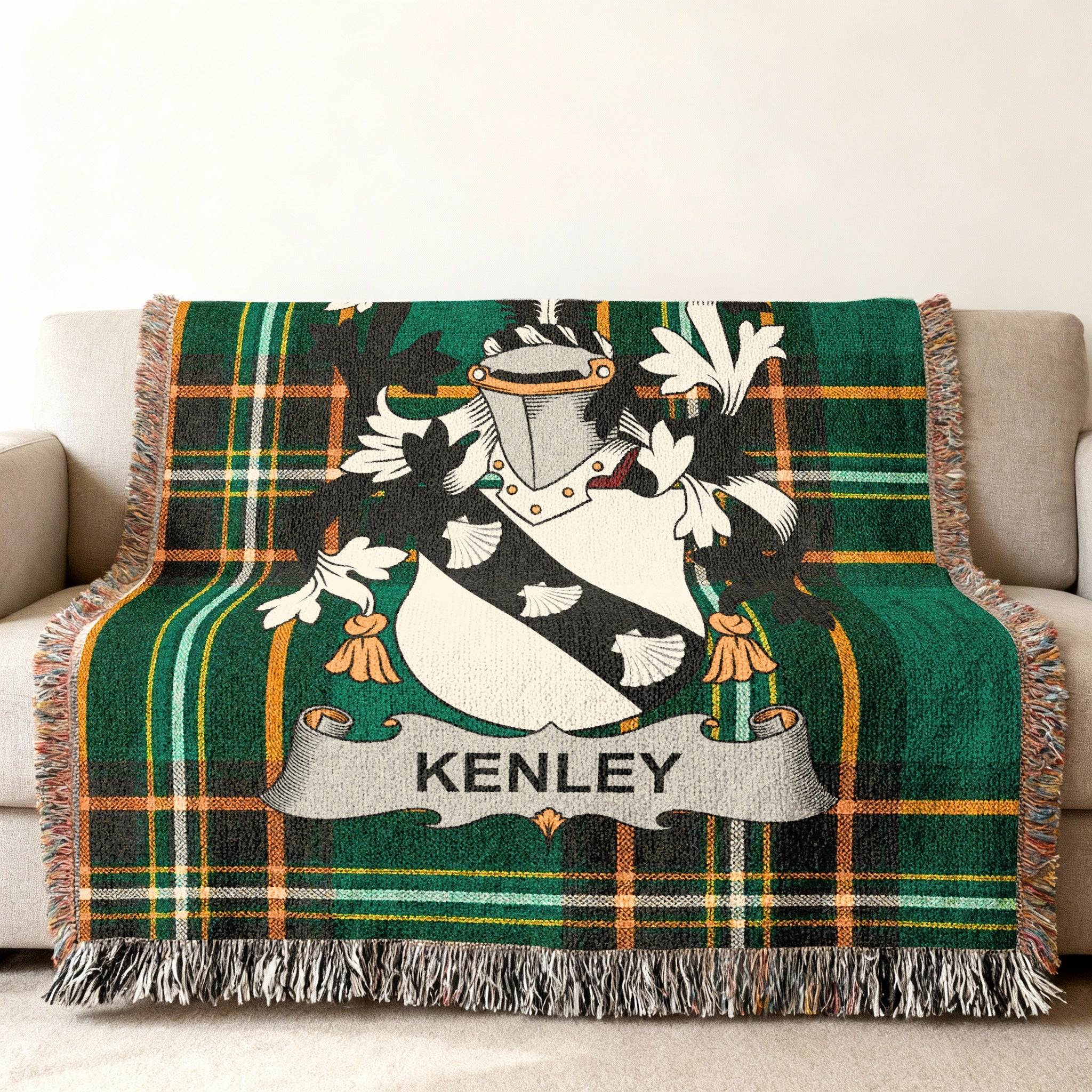 Kenley tartan throw blanket with a coat of arms.