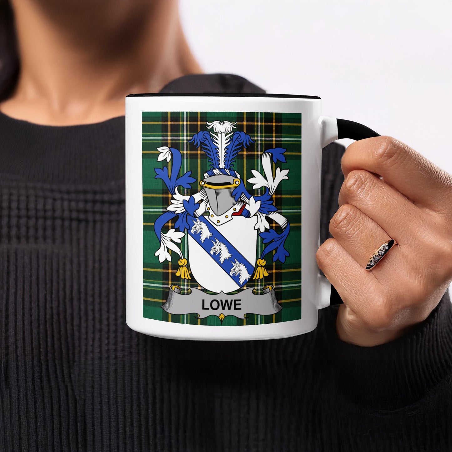 Mug with Lowe family crest on tartan background.