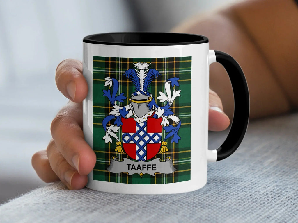 Mug with Taafe family crest on a tartan plaid background.