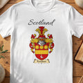 White Fennison Scottish family shield T-shirt featuring gold roundels and a gold band on red