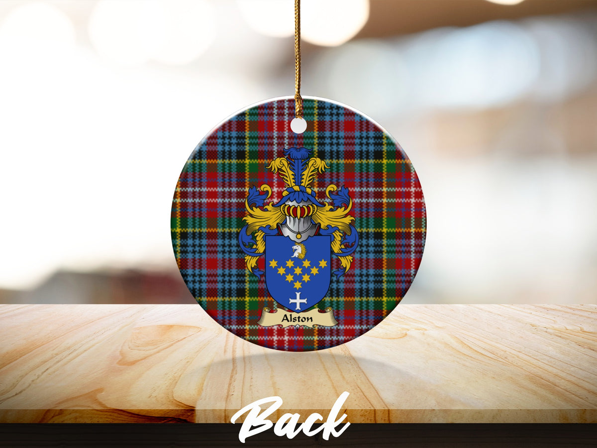 Round Alston Scottish clan ornament with family crest on a Caledonia tartan background