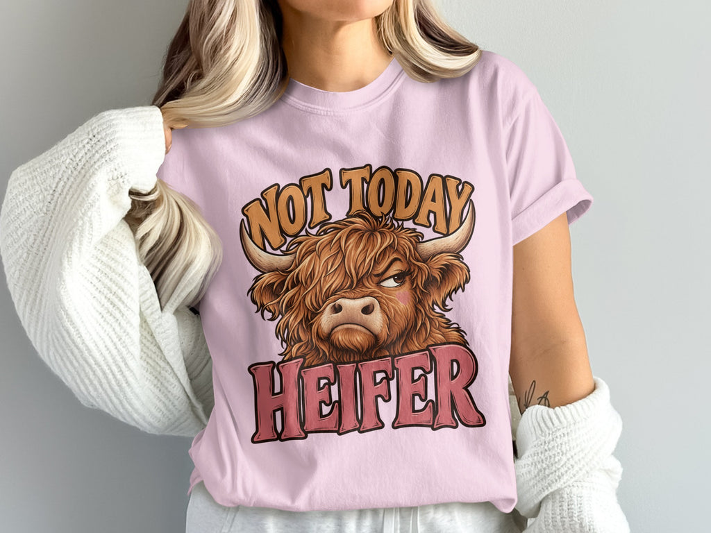 Model wearing the Not Today Heifer Highland cow Comfort Colors T-shirt in Blossom