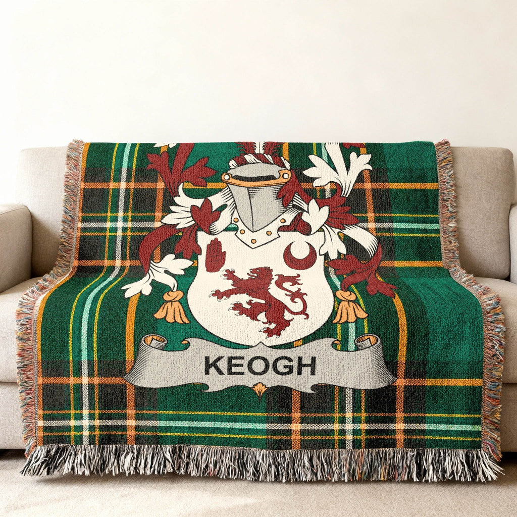 Green plaid throw blanket featuring the Keogh family crest.