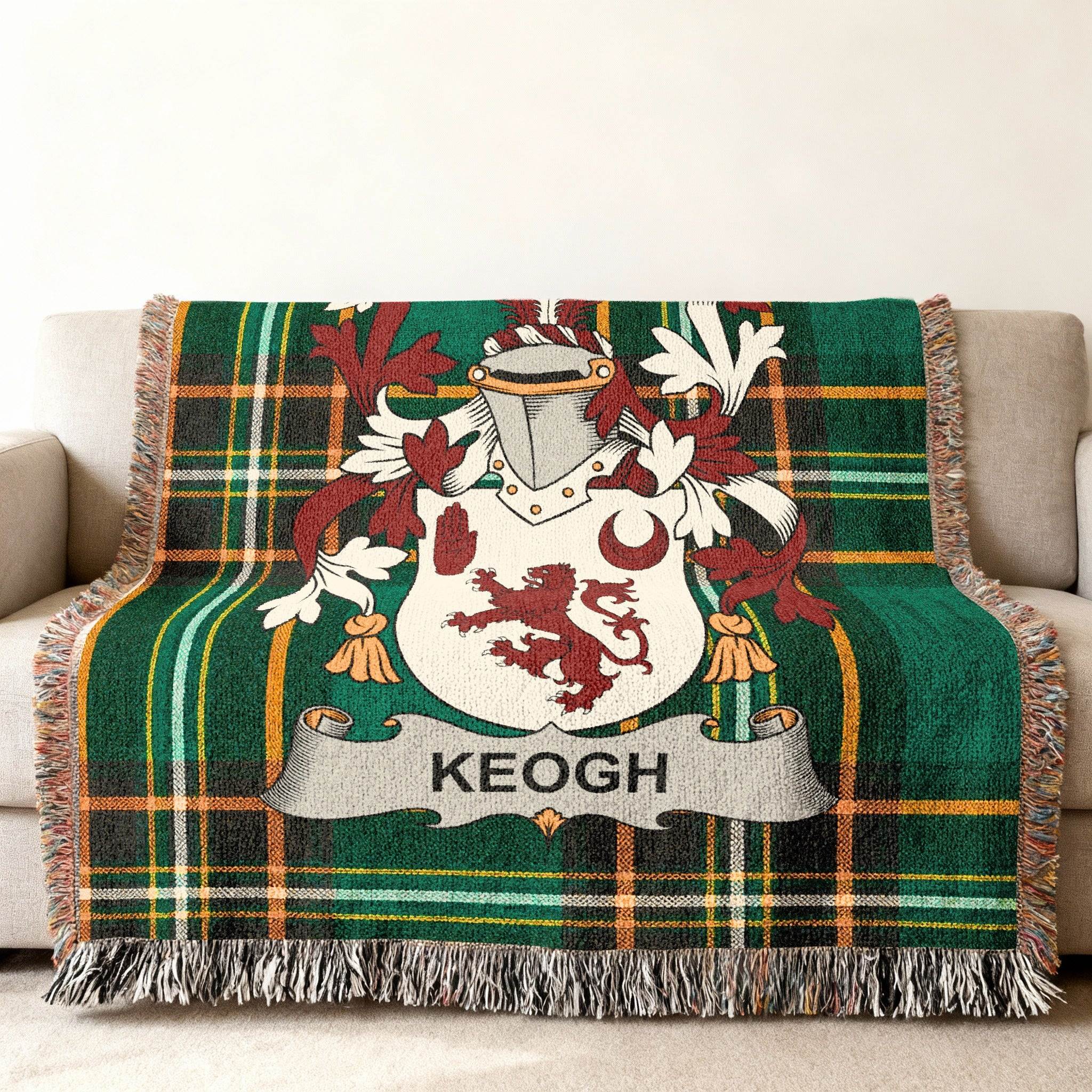 Green plaid throw blanket featuring the Keogh family crest.