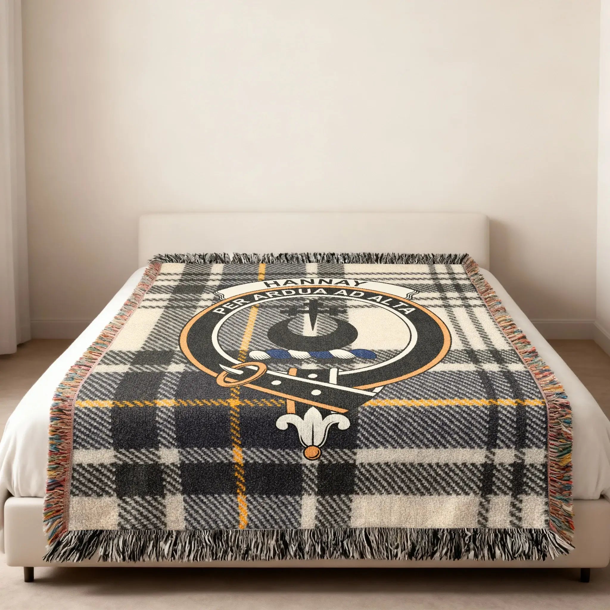 Hannay tartan woven blanket — 52x37 inch size showing tartan weave and crest detail