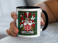Tirrell coat of arms on a white mug with black handle and rim.