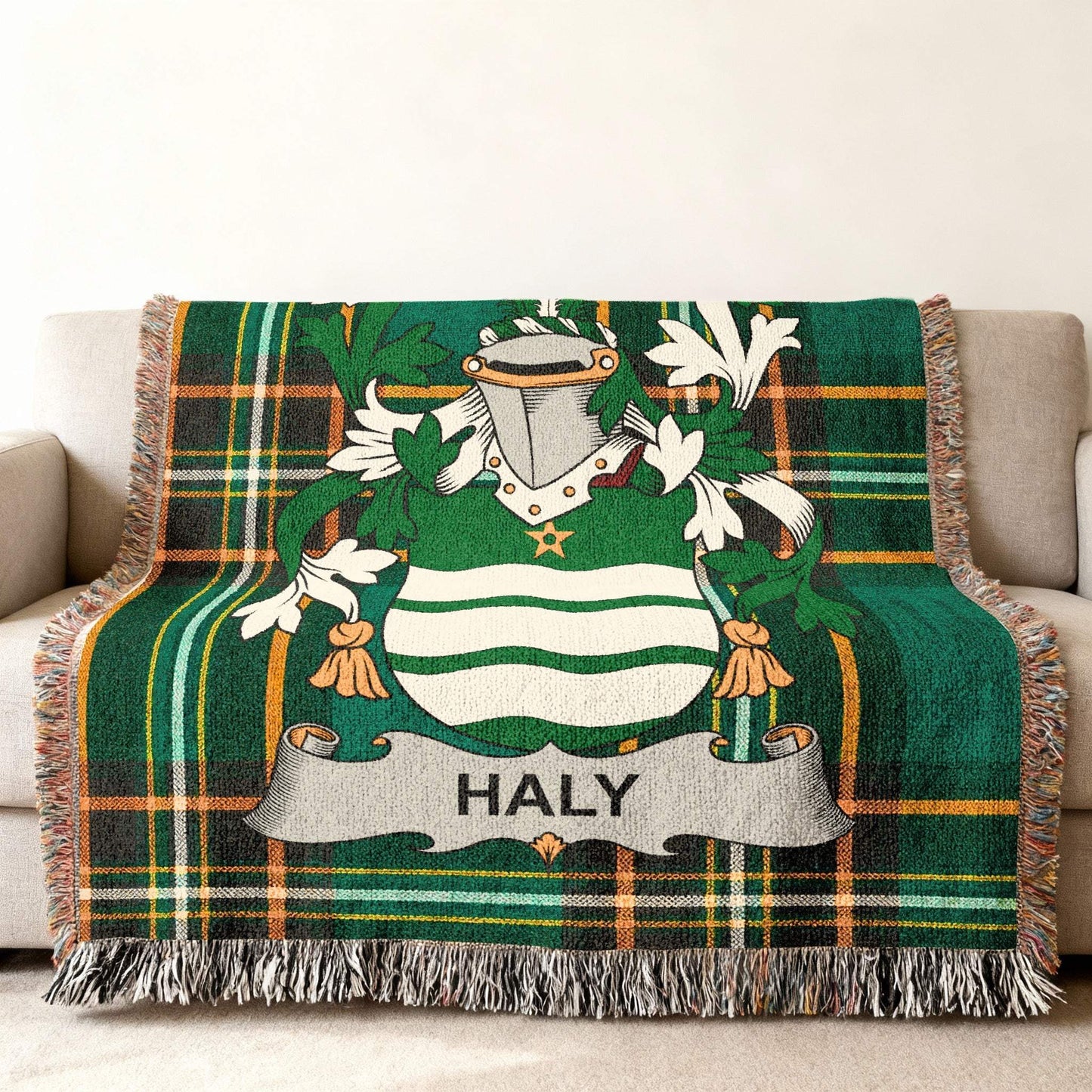 Green tartan throw blanket featuring the Haly family crest.