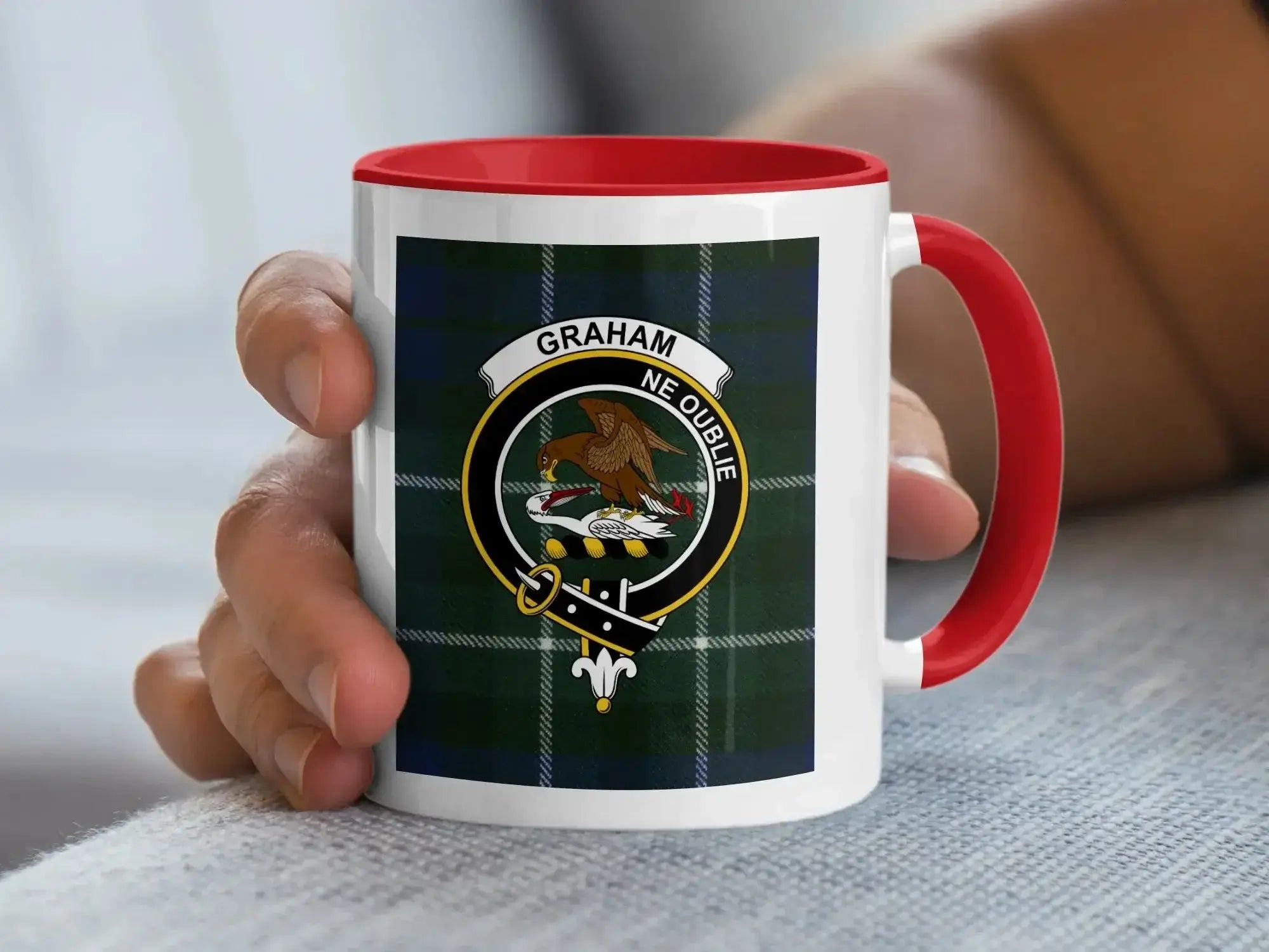 Clan Graham 15oz mug pair — black accent handles, blue-green plaid crest on white ceramic