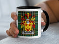 White mug with black rim displaying a family crest with the name "WORTHING".