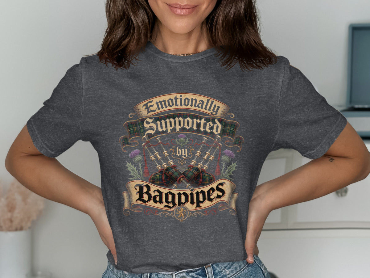 Dark grey t-shirt with "Emotionally Supported by Bagpipes" text and bagpipes graphic.