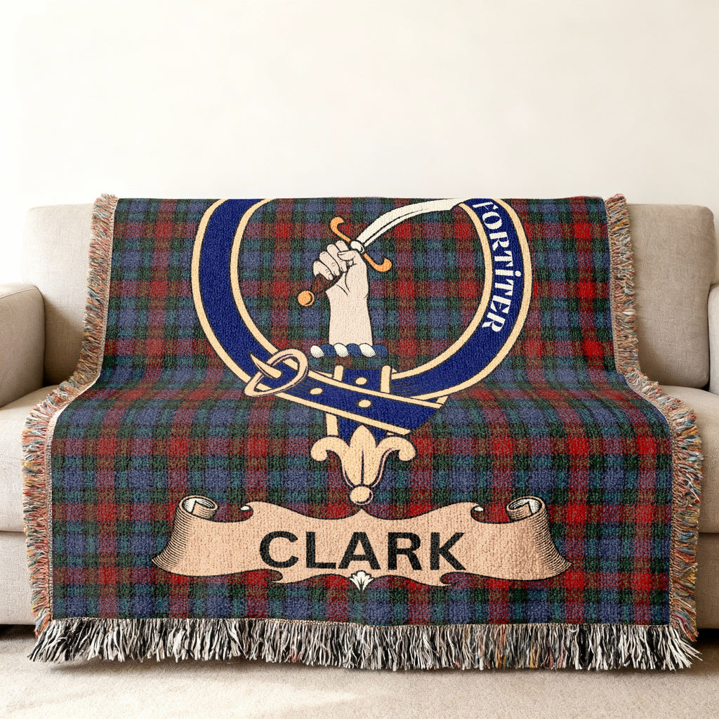 Clark clan tartan blanket with Fortiter motto draped on a couch