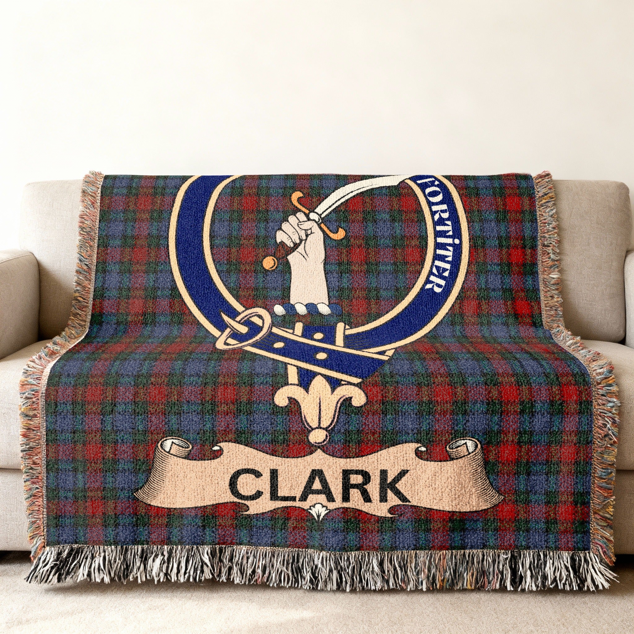 Clark clan tartan blanket with Fortiter motto draped on a couch