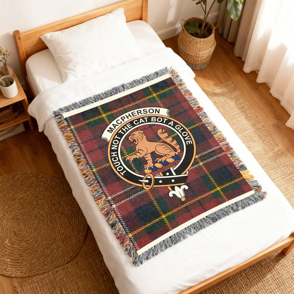MacPherson clan crest tartan woven blanket folded — cotton construction with fringe edge detail