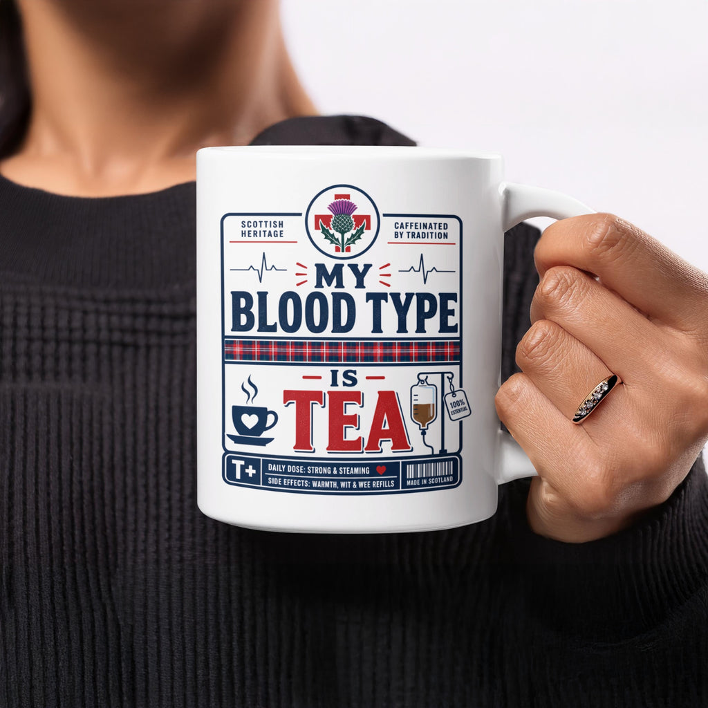 Mug with "My Blood Type is Tea" design featuring Scottish heritage and tea iconography.
