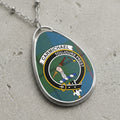 Carmichael clan Scottish tartan necklace with clan crest and Toujours Prest motto on tartan background