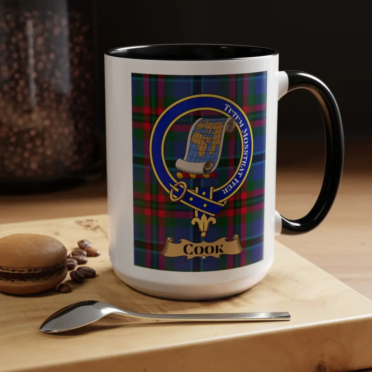 Close-up of the Cook clan crest printed on a ceramic mug
