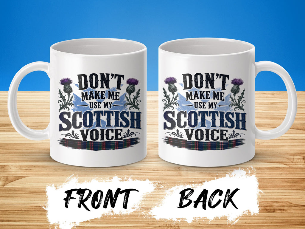 Mug with "Don't Make Me Use My Scottish Voice" text, thistle, and plaid.