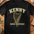 Kenny Irish harp T-shirt in Black, with cream surname lettering, a gold-toned harp, green shamrock and “Irish Heritage” text.