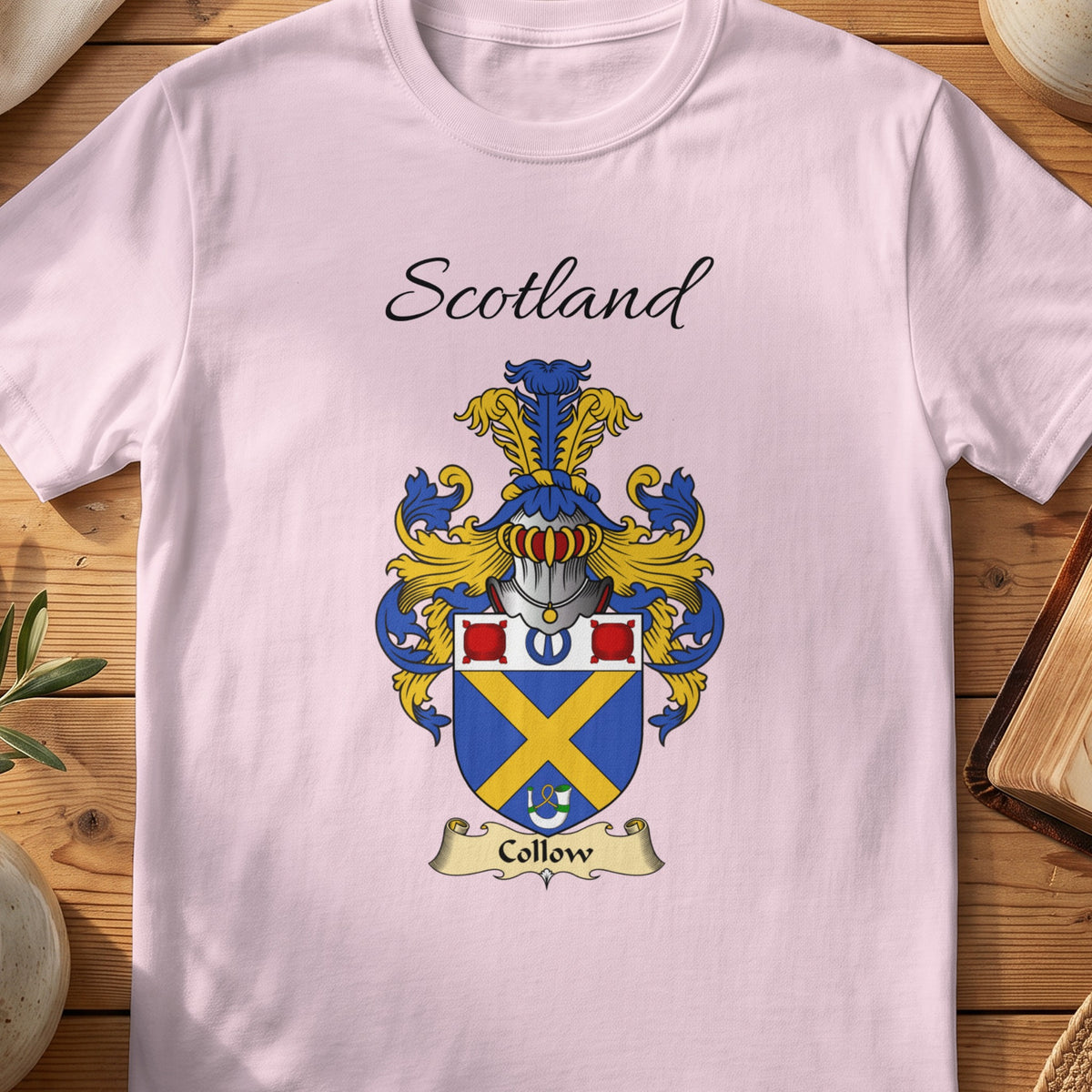 Light Pink Collow Scottish family shield T-shirt featuring a gold diagonal cross on blue
