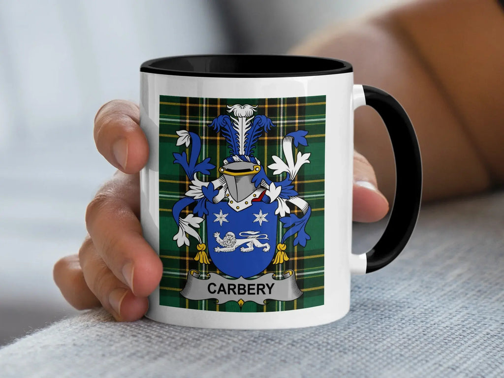 White mug with black rim featuring the "CARBERY" family crest on a tartan background.