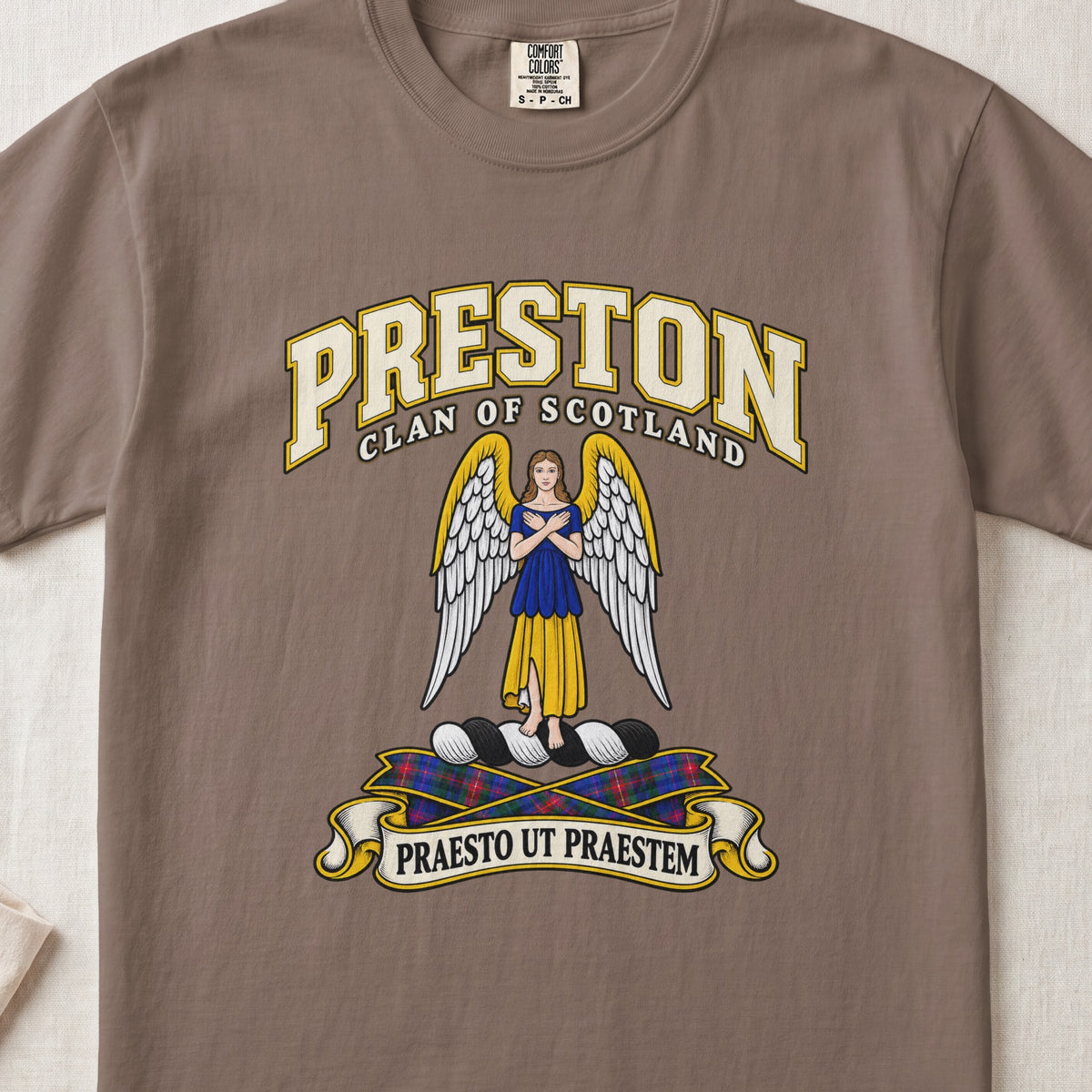Preston Scottish clan T-shirt in Espresso, front view with a winged figure in blue and gold clothing and motto banner.