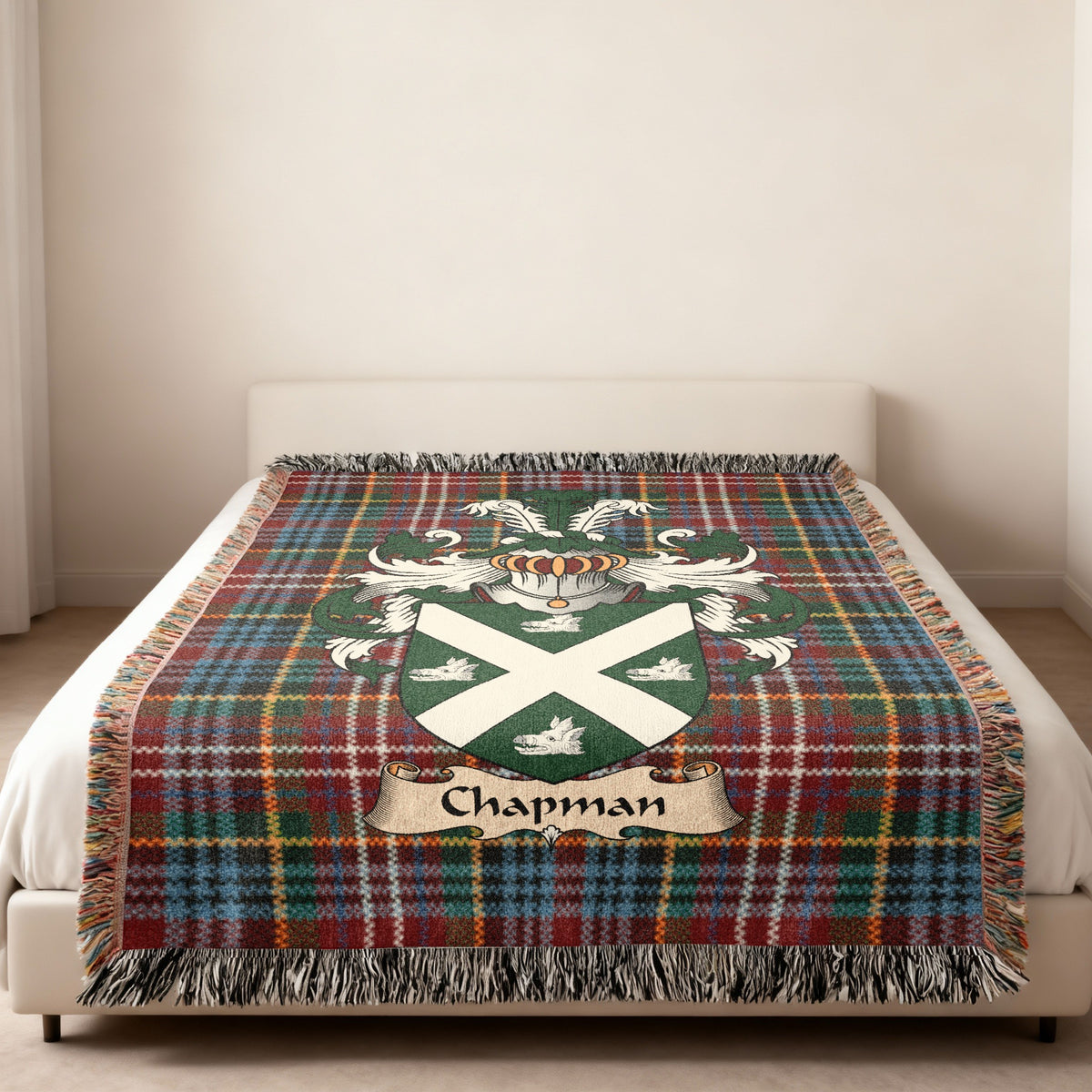 Chapman Scottish family shield woven blanket on a Caledonia tartan background