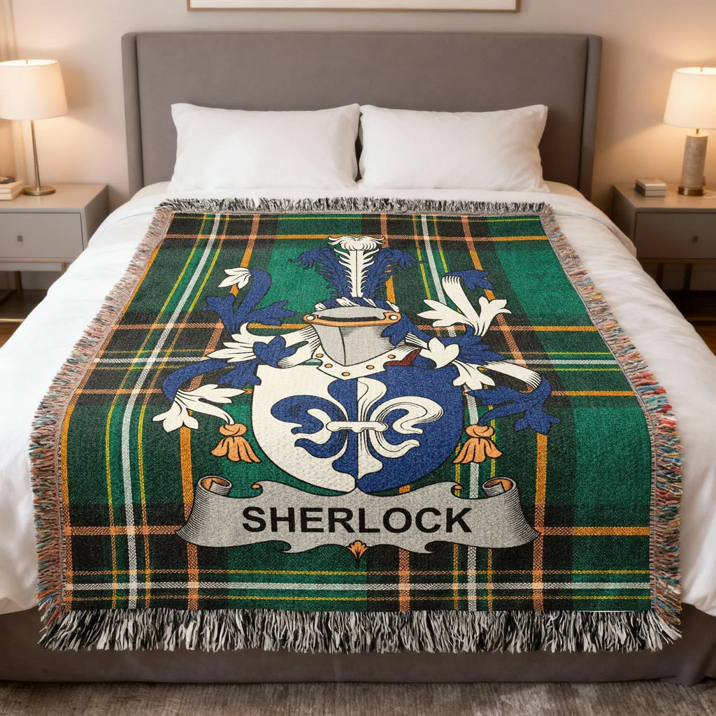 Sherlock family crest tartan blanket on a bed.