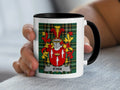 White mug with black rim featuring a Scottish tartan and a family crest with the name "KYAN".